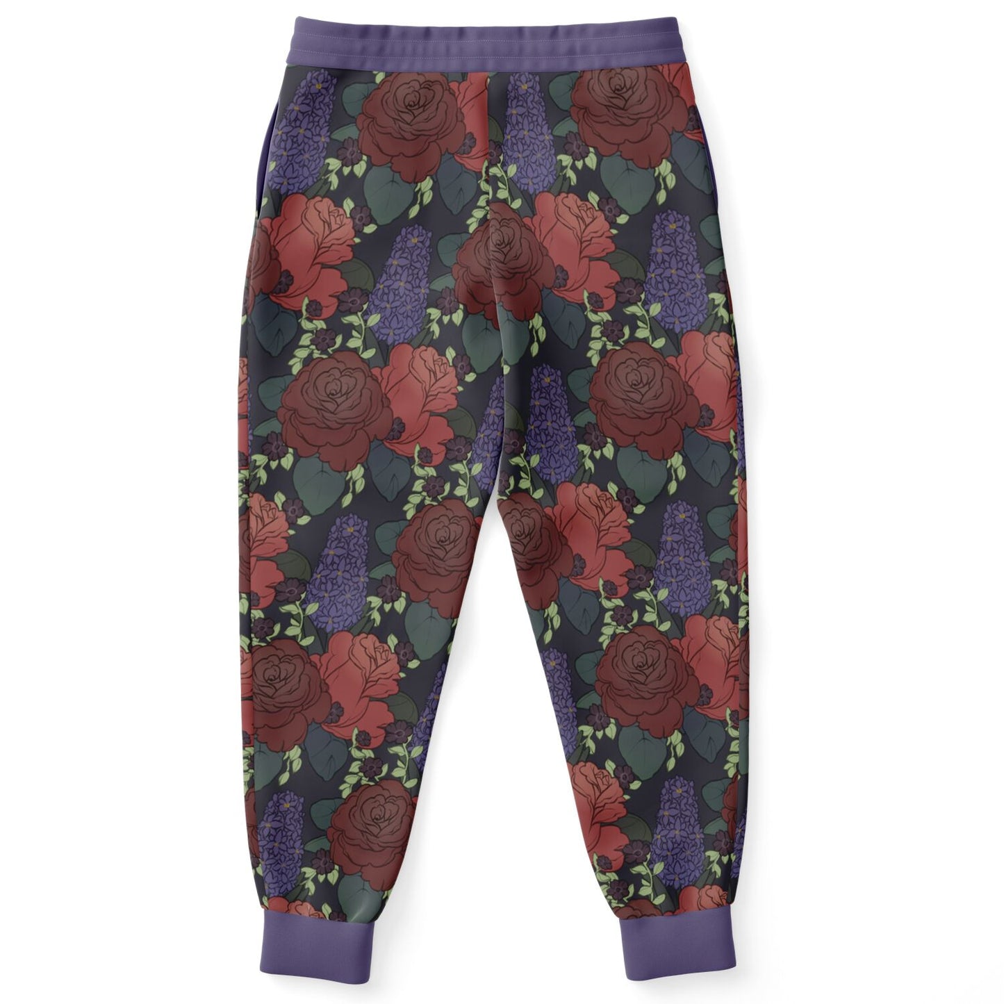 The back of a pair of joggers lying flat., it has a black, flat drawstring. The base colour is dark grey, and it has a repeating pattern. The pattern features two big red roses with dark green leaves, a large purple hyacinth, surrounded by small black petunias with bright green leaves. The waistband and cuffs are purple.