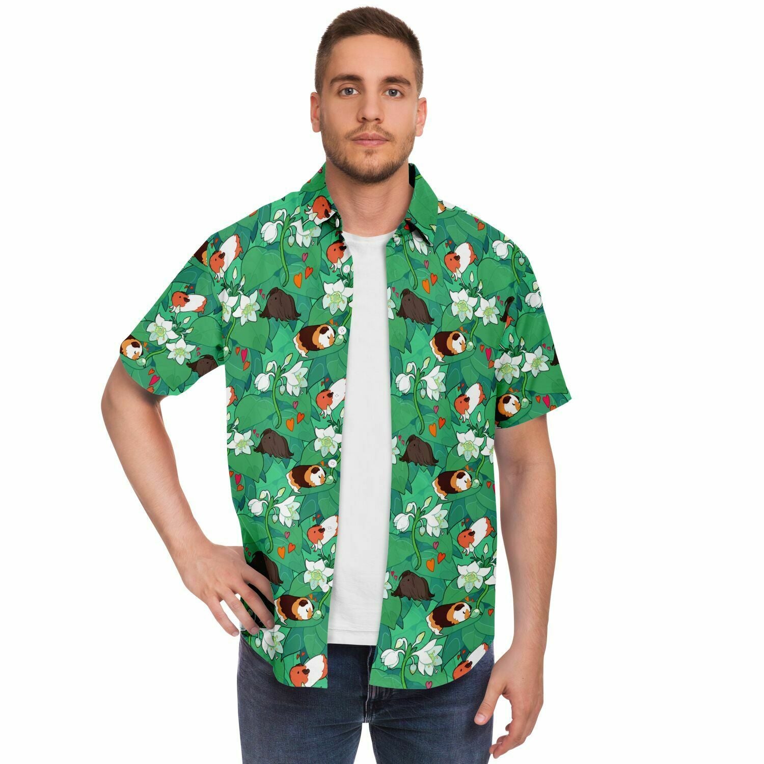 A model wearing a button down. The button down's pattern features guinea pigs and delphinium flowers on a green leafy background.