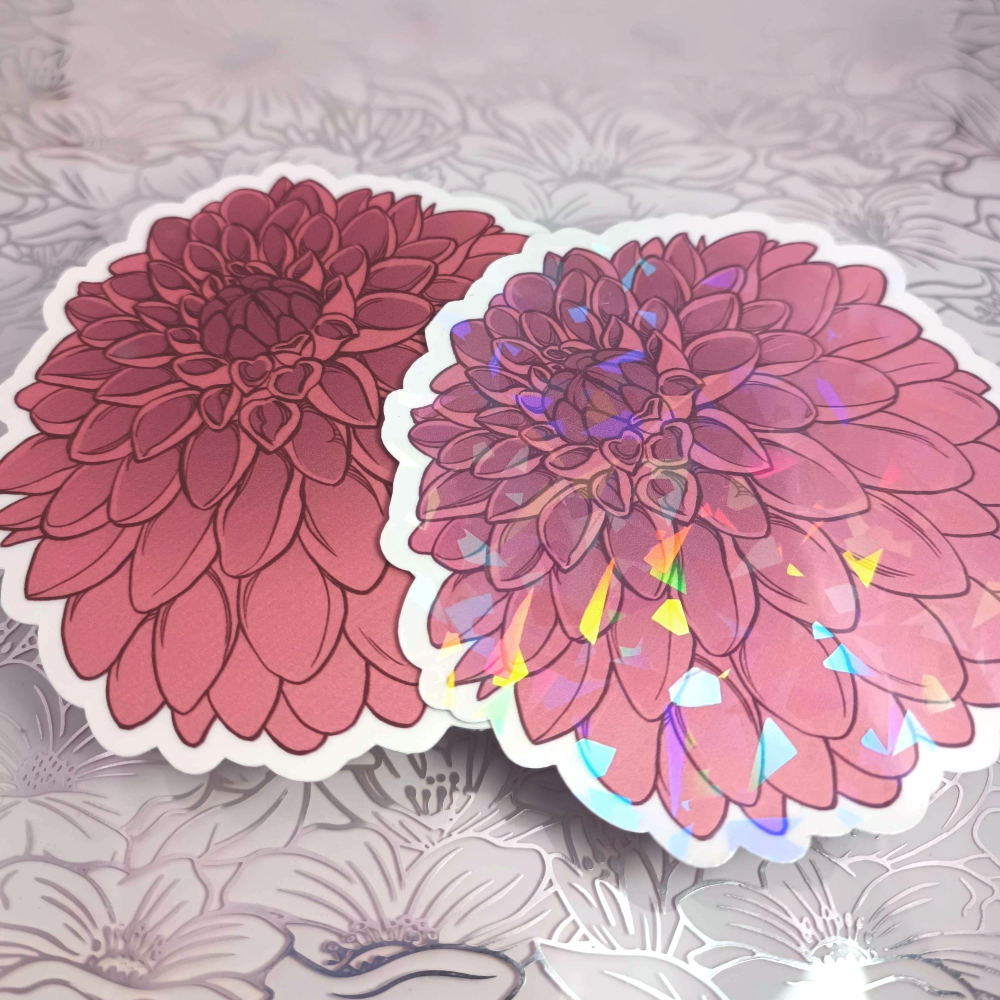 Two stickers of dark red Dahlias, one is matte, the other has holo shards.