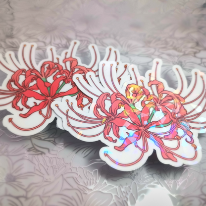 Two red spider lily stickers, one matte, the other with holo vinyl.