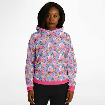 A model wearing a hoodie. The hoodie's pattern features cute round birds and magnolia on a purple background. The trims are pink. 