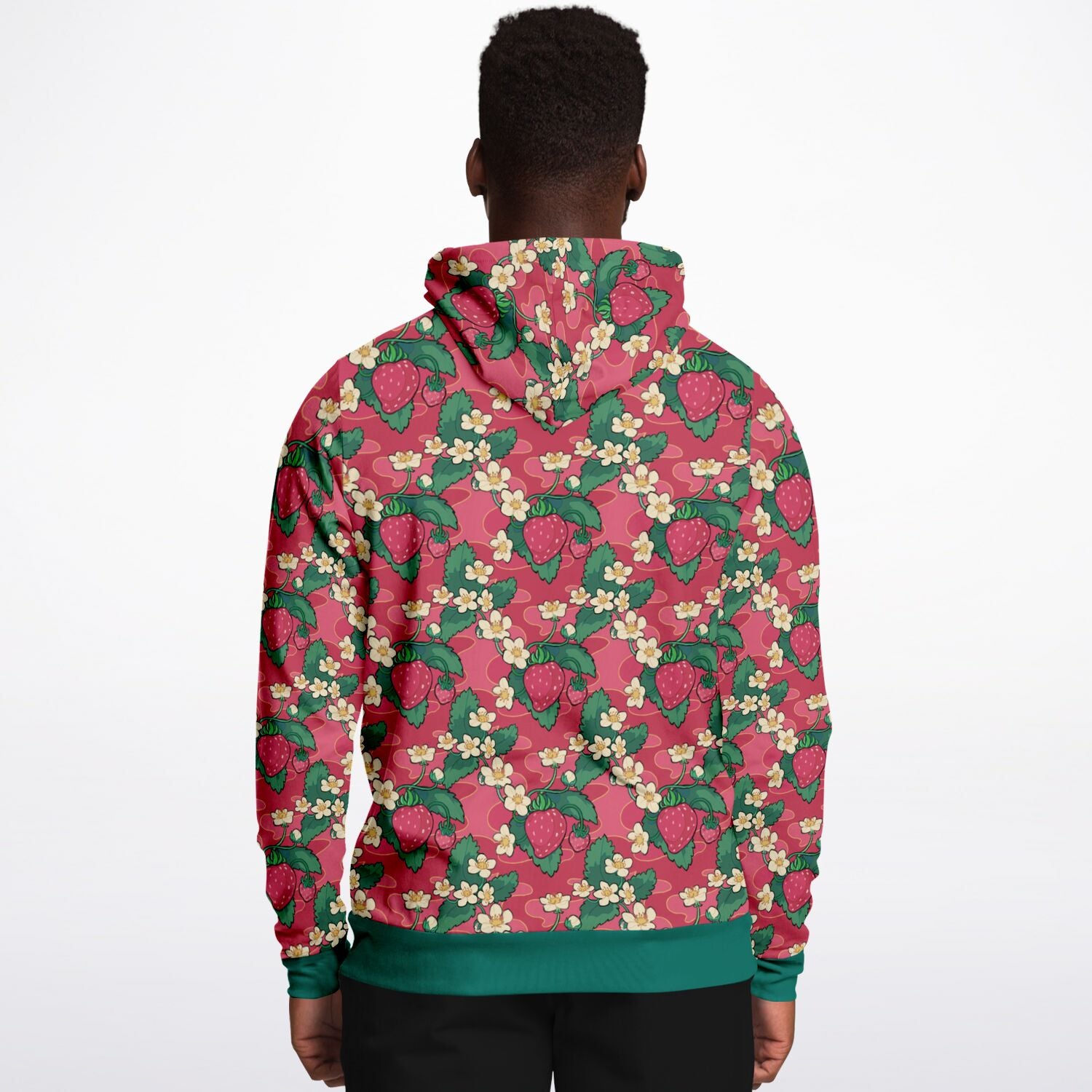 A model wearing a hoodie. The hoodie's pattern features strawberries and strawberry blossoms. The trims and lining of the hoodie are green. 