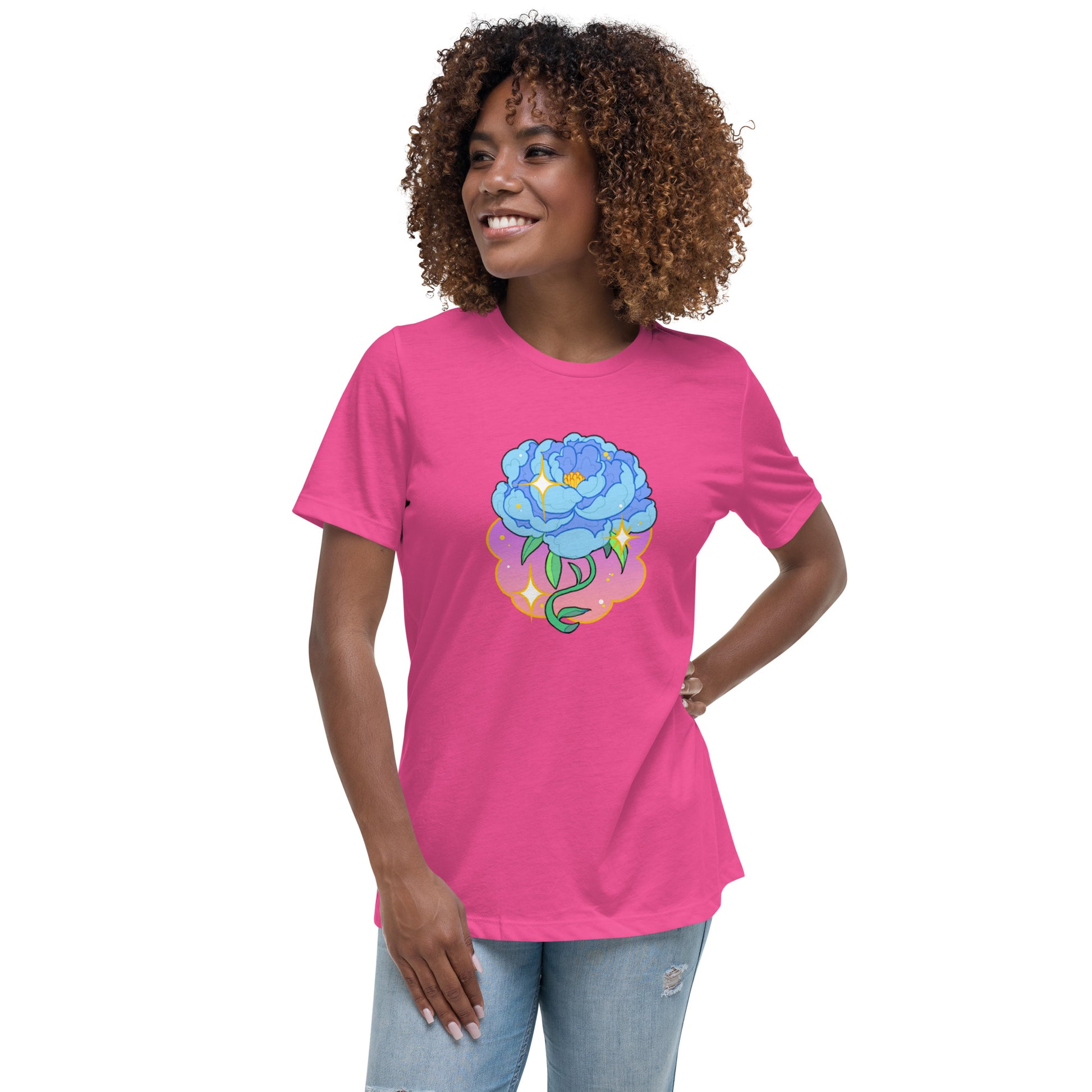 A model wearing a pink tshirt. It has a print of a blue peony flower on the front.