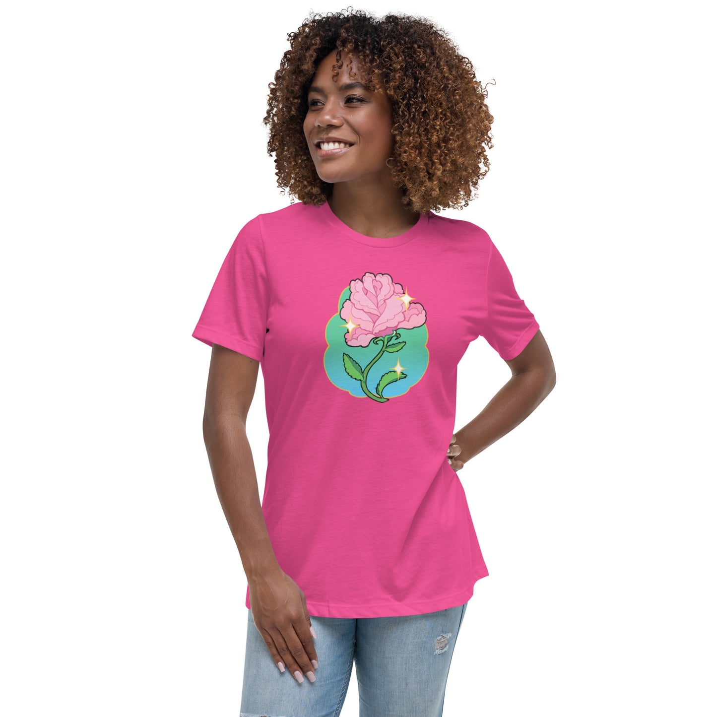 A model wearing a pink tshirt. It has a print of a pink rose flower on the front.