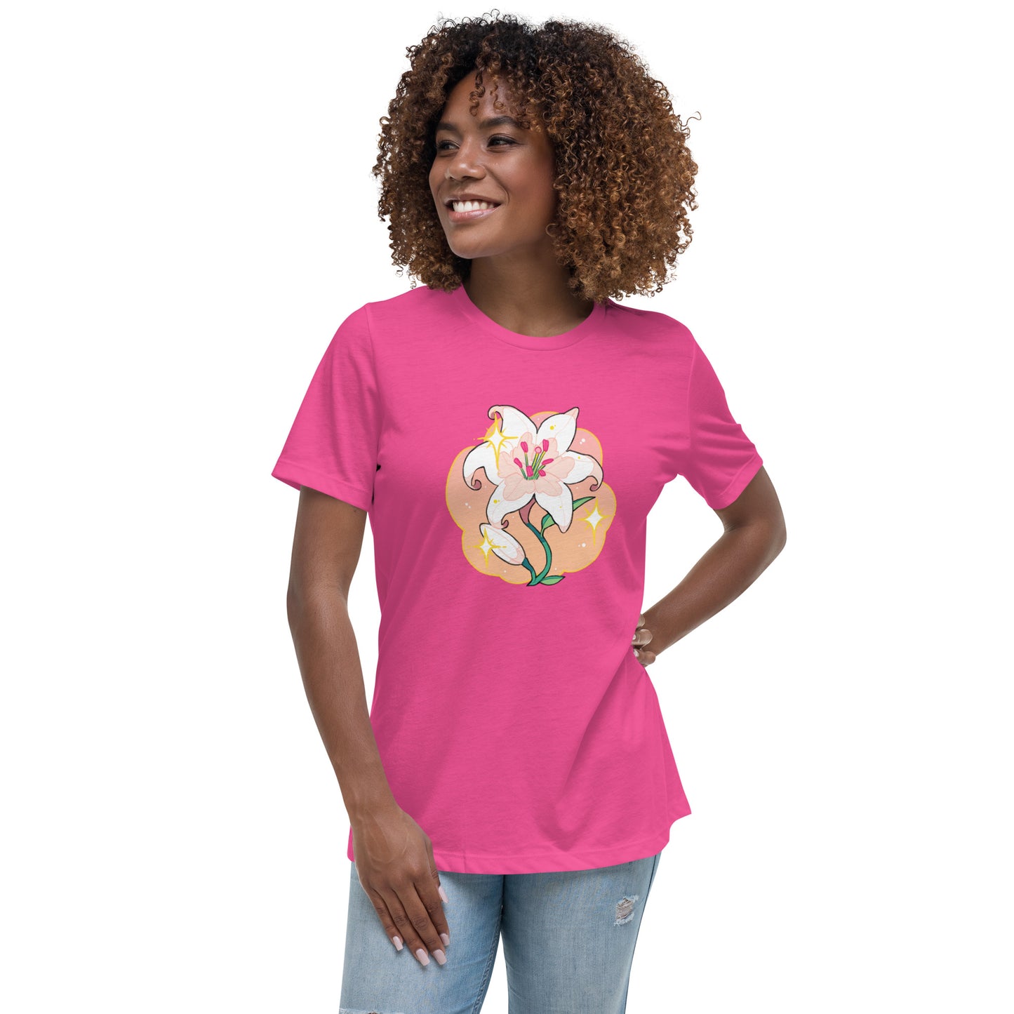 A model wearing a pink tshirt. It has a print of a white lily flower on the front.