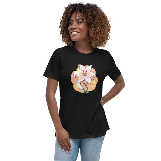 A model wearing a black tshirt. It has a print of a white lily flower on the front.