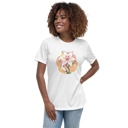 A model wearing a white tshirt. It has a print of a white lily flower on the front.