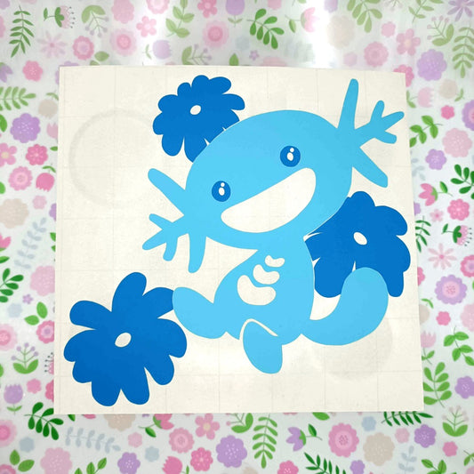 Blue vinyl stickers of Wooper. It's happily floating between flowers.