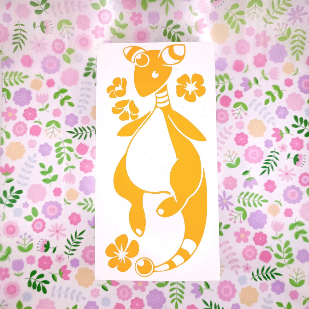 Yellow vinyl sticker of Ampharos. It's floating and surrounded by stylized hibiscus flowers.